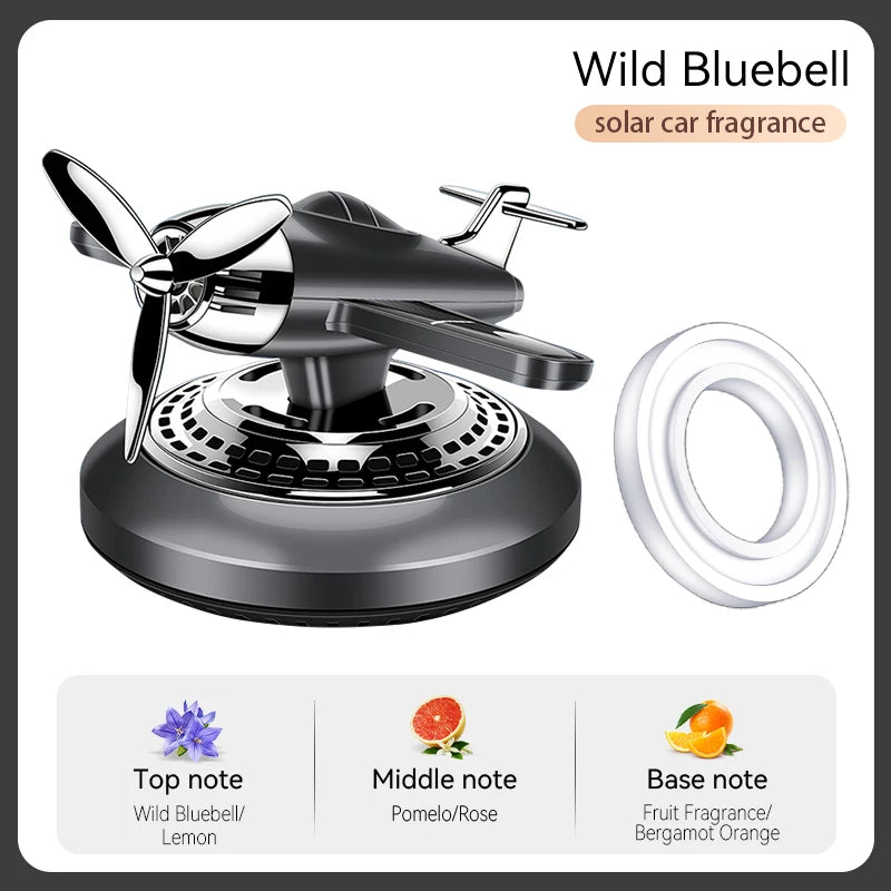 Rotating solar energy powered fighter car air freshener