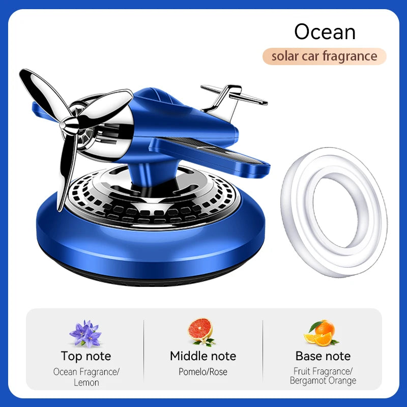 Rotating solar energy powered fighter car air freshener